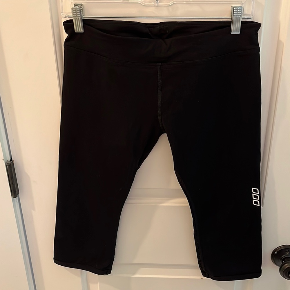 Black knee length leggings with mesh detail